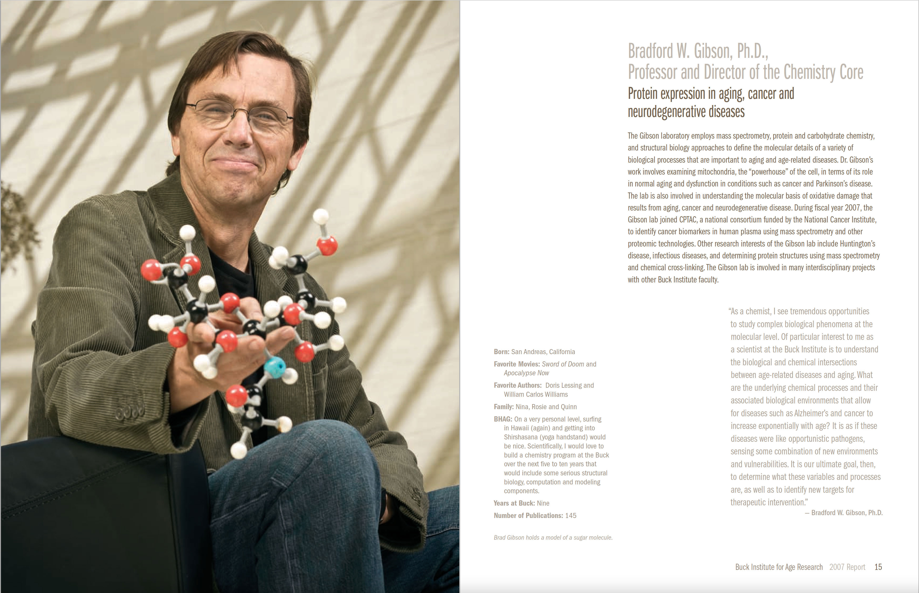 Scientist holding molecular model